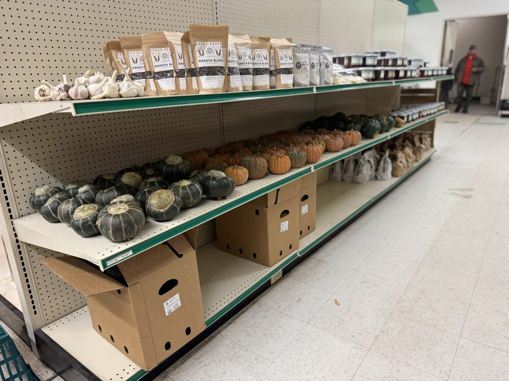 Fresh and dried food on shelves.
